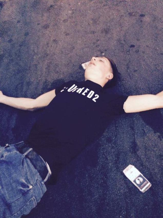 Illustration for article titled Premier League Starlet Pictured Passed Out In Middle Of The Road